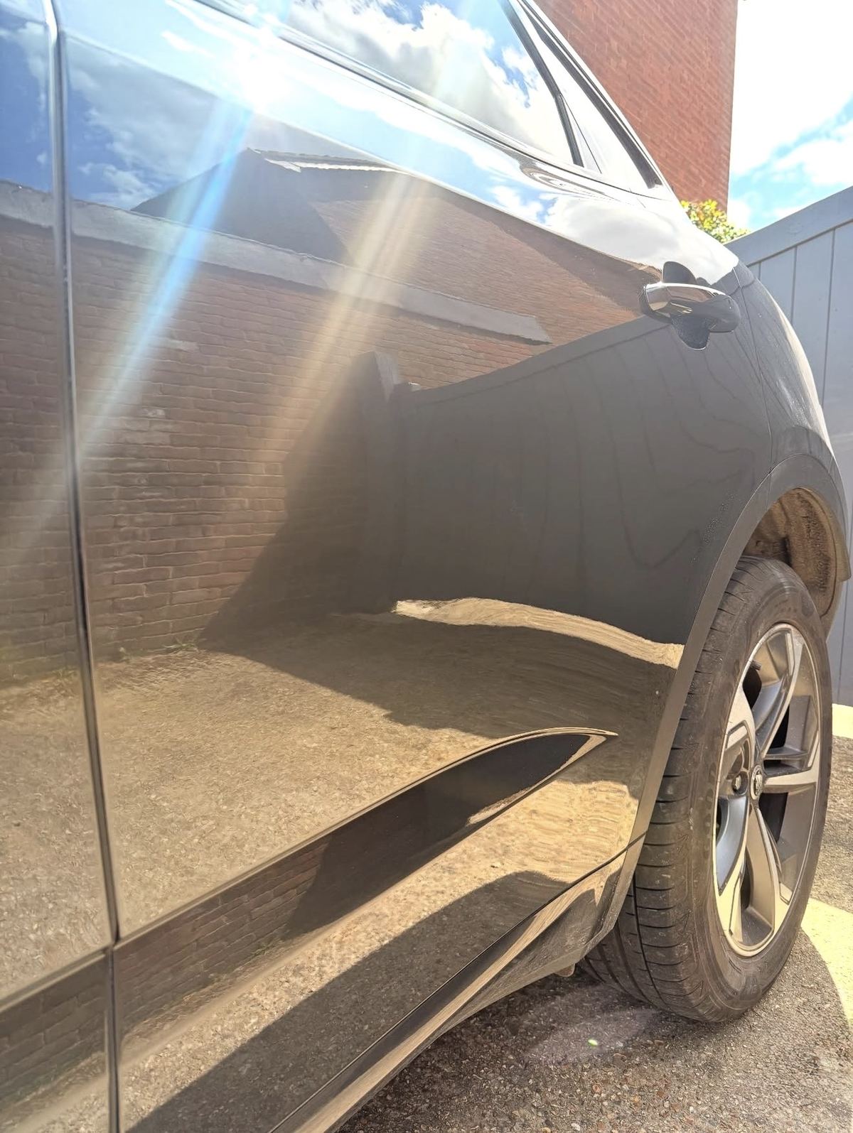 Jaguar F-Pace rear door scratch after repair