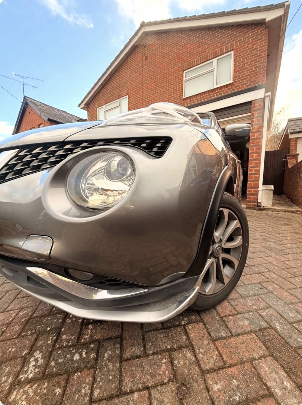 Same Nissan Juke front bumper after colour-matched repair — damage invisible