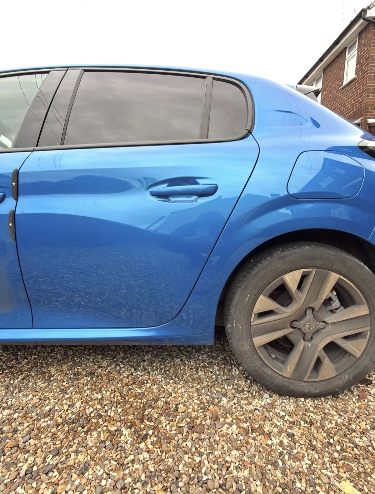 Peugeot door scratch after repair