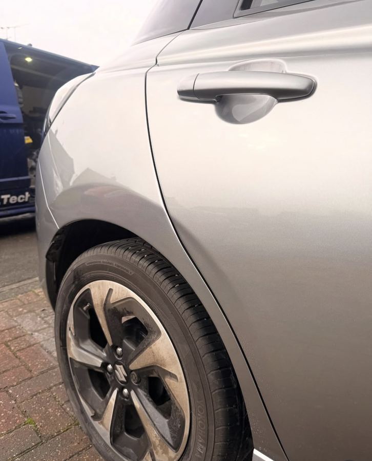Suzuki rear quarter dent repair Guildford Surrey after