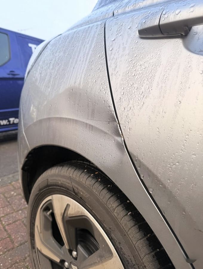 Suzuki rear quarter dent repair Guildford Surrey before